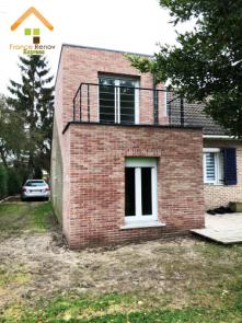 Transformation de garage en extension avec balcon